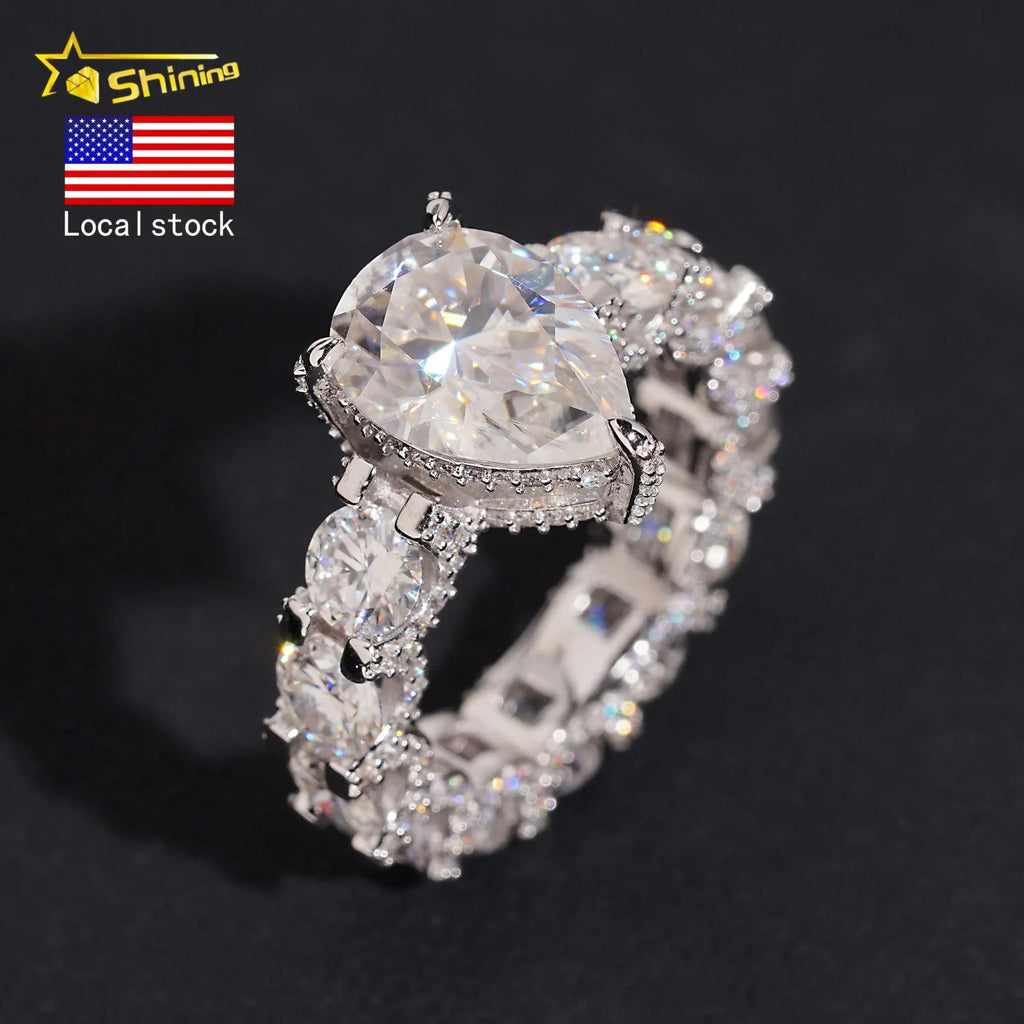 Moissanite pear cut engagement ring in 925 silver with claw setting and warehouse pass diamond tester verification