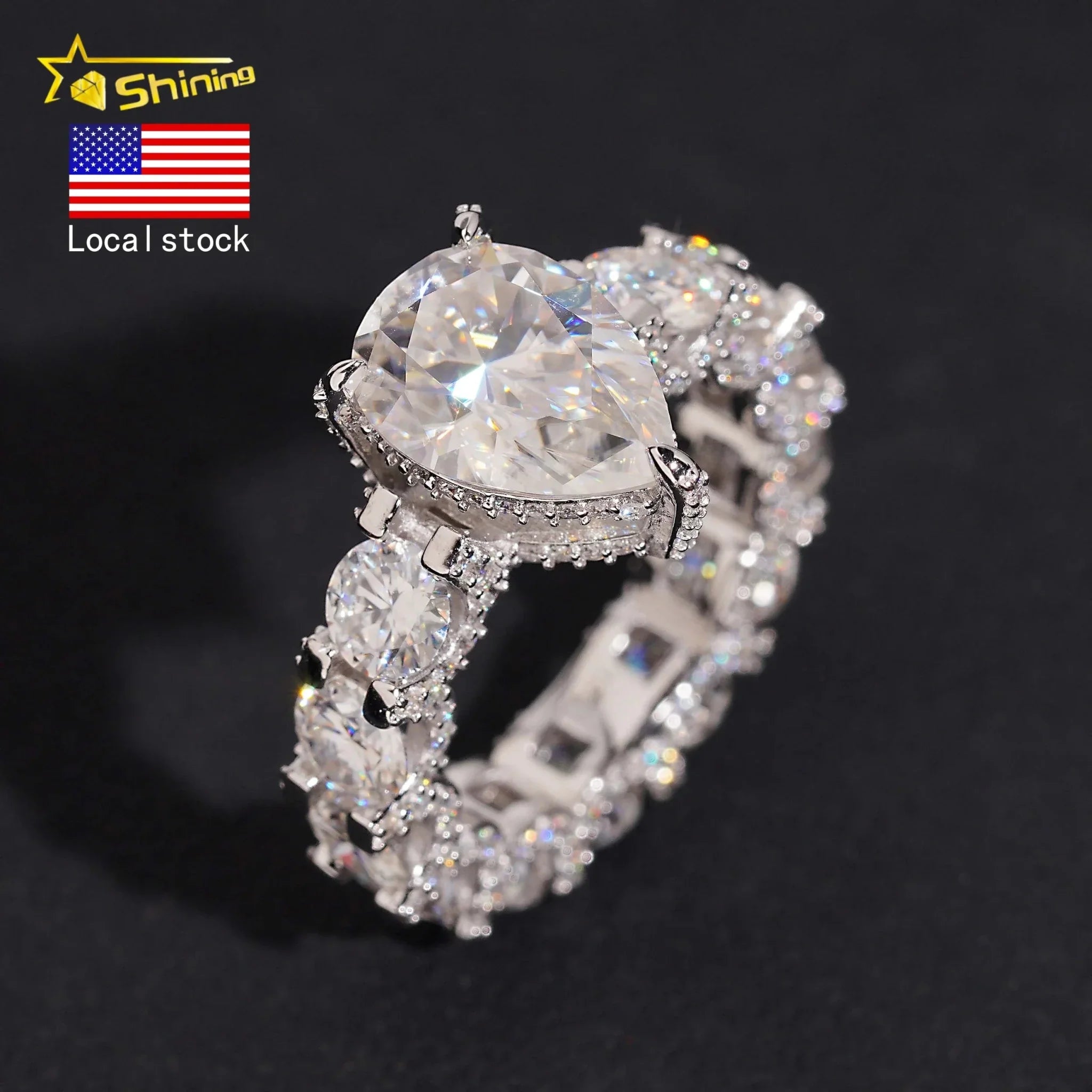 Moissanite pear cut engagement ring in 925 silver with claw setting and warehouse pass diamond tester verification